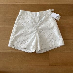 White lace high waisted shorts
